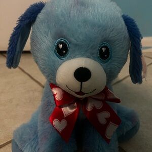 Blue Plush Dog Toy with Red Bow